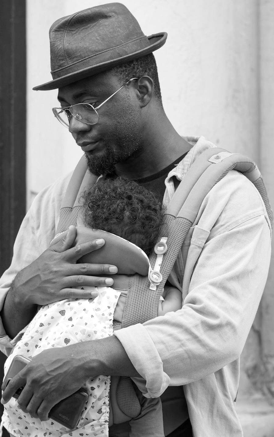 A father holding his daughter